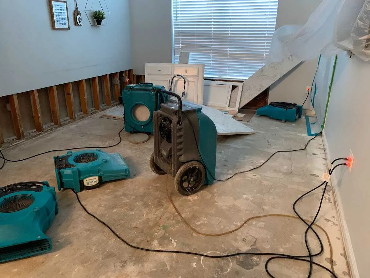 Dehumidifier in flood-cut room for Water Damage Restoration in River Falls